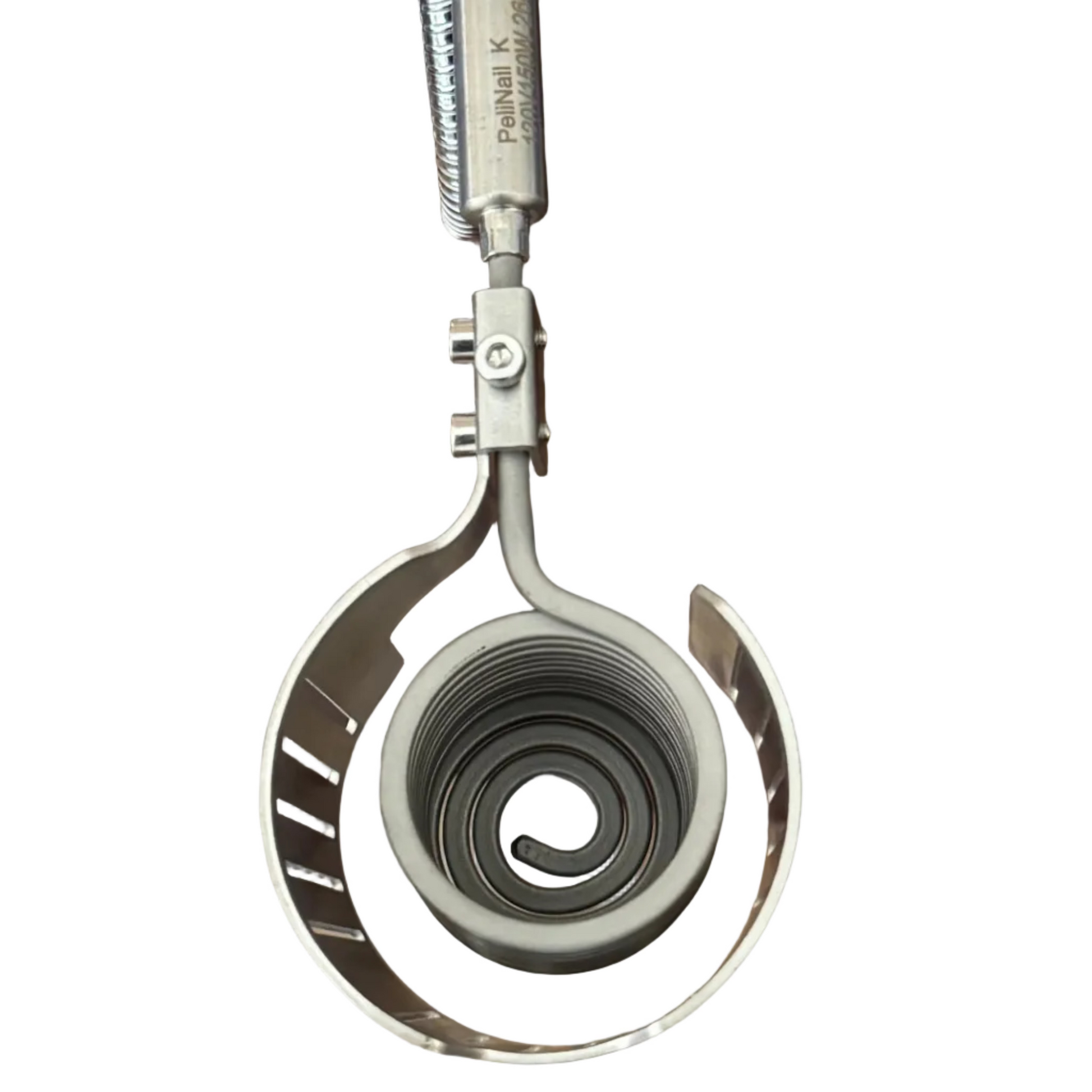 A close-up of a metal coil tool or clamp with a silver spring-loaded arm and a wooden mounting block, photographed on a tabletop with stone tile flooring visible.